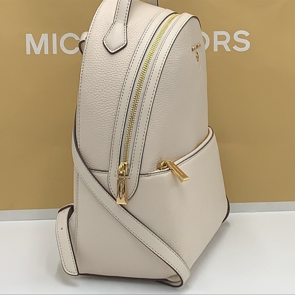 Michael Kors Women's Valerie Medium Pebbled Leather Backpack
Light Cream
NWT - Picture 15 of 16